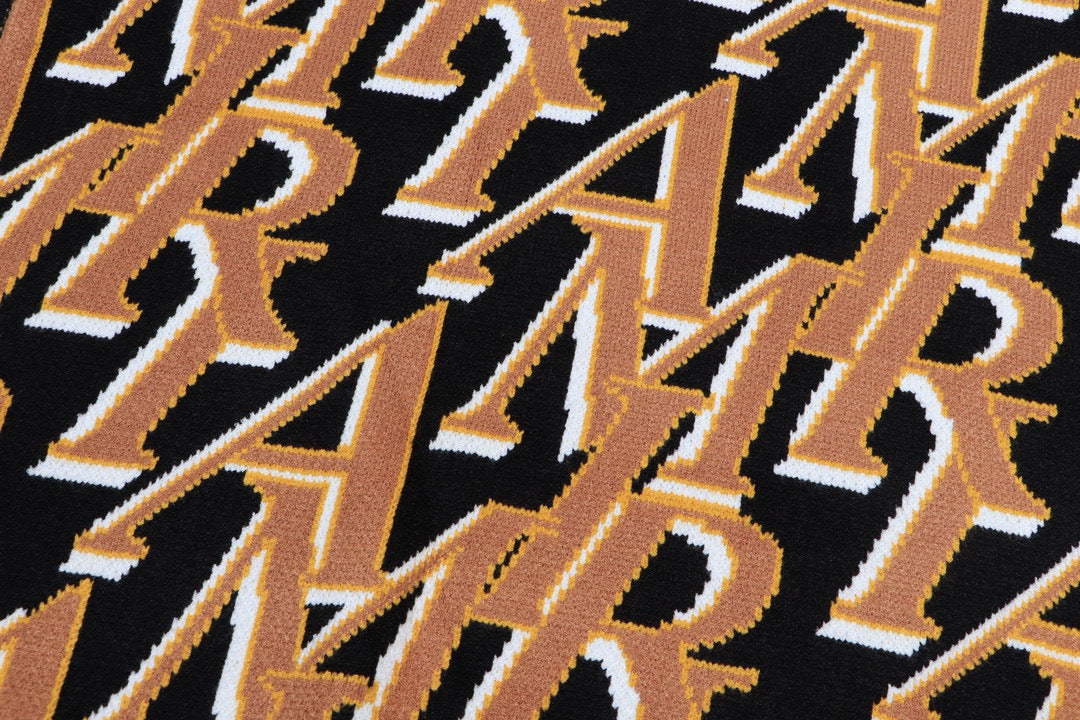 AMIRI Repeat intarsia-knit polo shirt