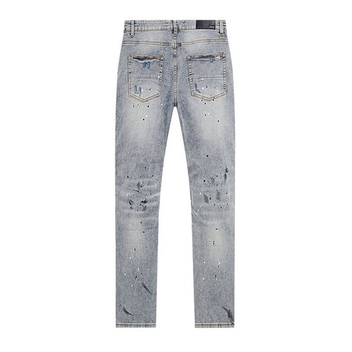 AMIRI Light Blue Distressed Paint Splatter Jeans