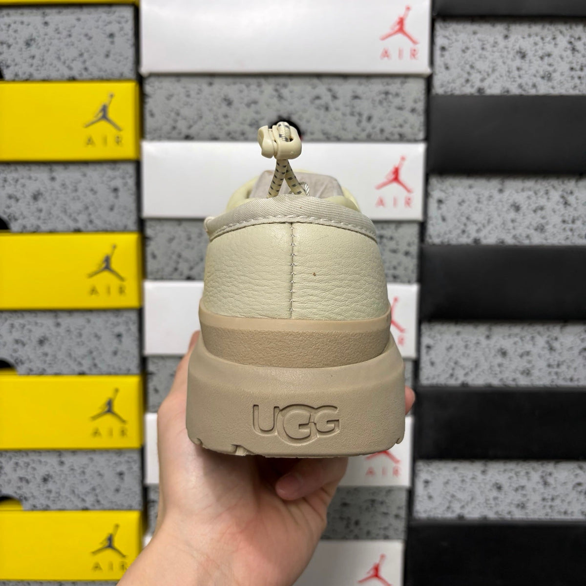 UGG Neumeel Deco Slip-On – Leather Moccasin Sneaker with Cream Lug Sole & Rope Drawstring in Cream