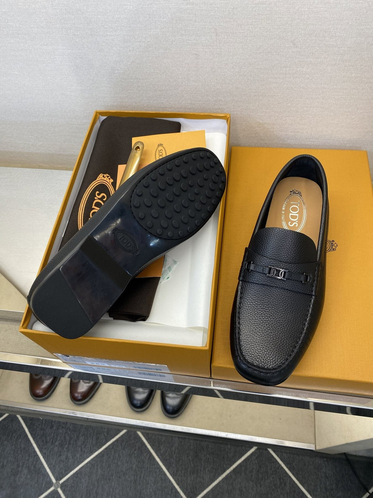Tod's Black Leather Penny Loafers